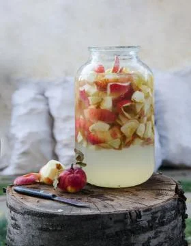 Making of apple vinegar - rustic scene from the yard Stock Photos