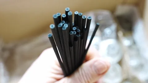 Making aroma diffusers with alcohol and essential oils using fiber sticks Stock Footage 304496424