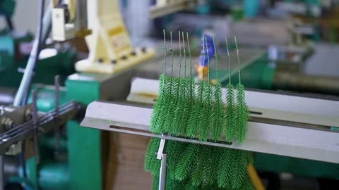 Making artificial Christmas trees. Plastic New Year's Tree Stock Footage 260416507