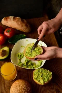 Making avocado toast Stock Photos