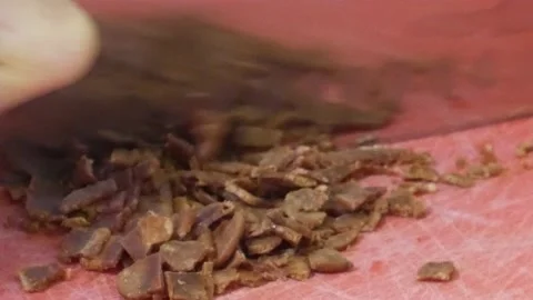 Making Bacon Bits/Cutting Bacon - Zoomed In Stock Footage 172259924