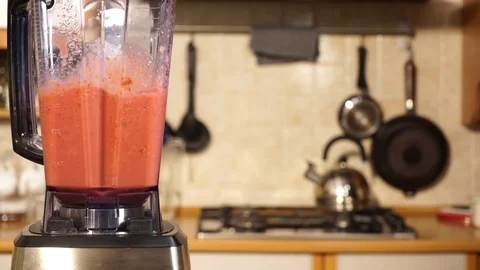 Making banana strawberry fruit shake in blender 4K Stock Footage