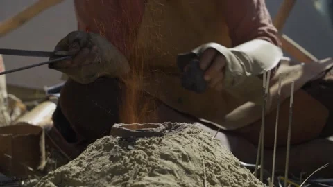Making beads. Glassblower make one bead. Ancient Slavic technique. Video stock 250388531
