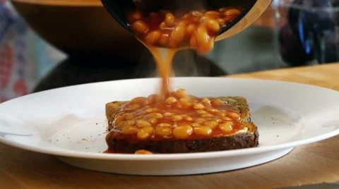 Making beans on toast, 4k, UHD Stock Footage 49624049