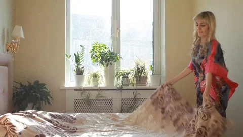 Making a Bed Stock Footage 73487123