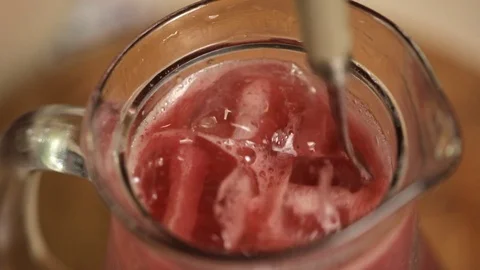 Making a berry cocktail with ice. Stock Footage 116822211