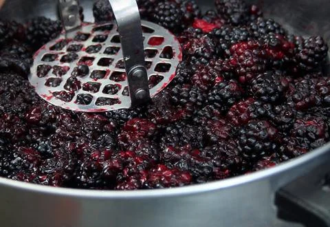 Making berry jam Stock Photos