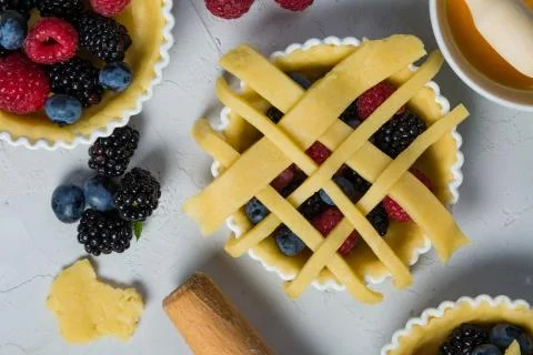 Making berry pie Stock Photos