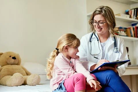 Making the biggest difference to the littlest people. Shot of a doctor having a Stock Photos