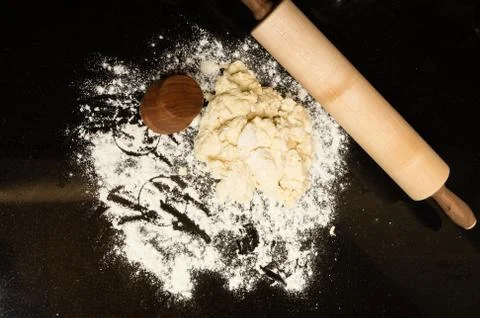 Making biscuits with rolling pin and dough Stock Photos