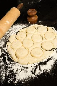 Making biscuits with rolling pin and dough Stock Photos