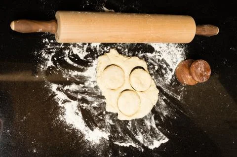Making biscuits with rolling pin and dough Stock Photos