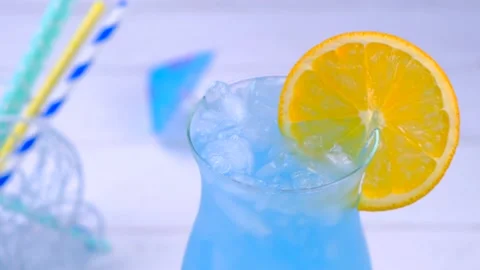 Making a blue cocktail or Blue Curacao Stock Footage 155681941