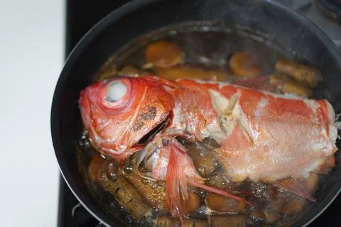Making boiled red snapper Stock Photos