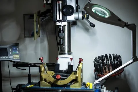 Making of bowling balls. Machine for drilling gripping holes Stock Photos