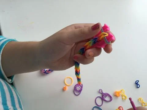 The making bracelets from rubber bands Stock Photos