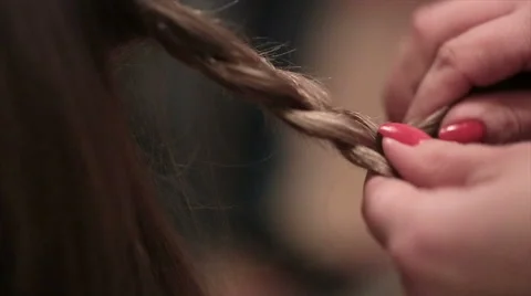 Making braid hairstyle Stock Footage 61757743