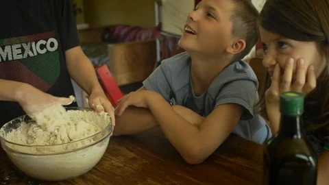 Making bread and talking Stock Footage 77442389
