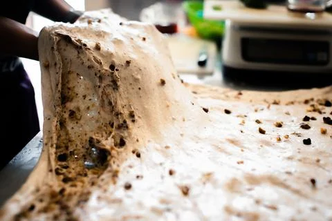 Making bread with cheese and nuts in the bakery Stock-Fotos