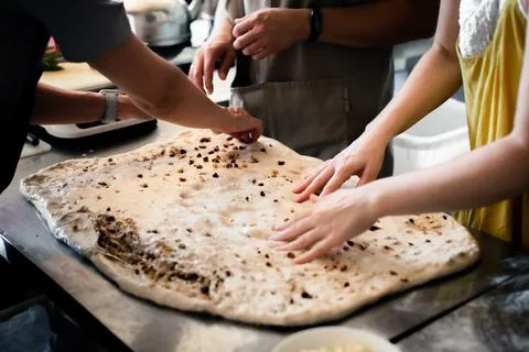 Making bread with cheese and nuts in the bakery Stock Photos