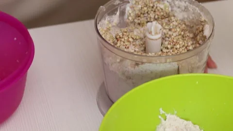 Making bread from green buckwheat. Containers contain flax, pumpkin and sunfl Stock Footage 162170492