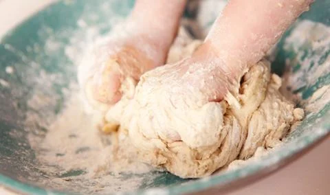 Making bread kneading dough Stock Photos