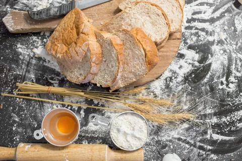 Making bread in Rustic style, Different kinds of bread rolls on wooden tabl.. Stock Photos