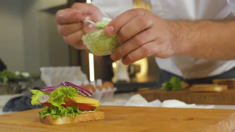 Making Bread Sandwich With Cheese And Salad By Chef In Restaurant Kitchen. Stock-Footage 151923408