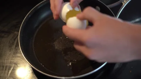 Making breakfast sandwich, cooking eggs, ham and egg sandwich, morning Stock Footage 262562667