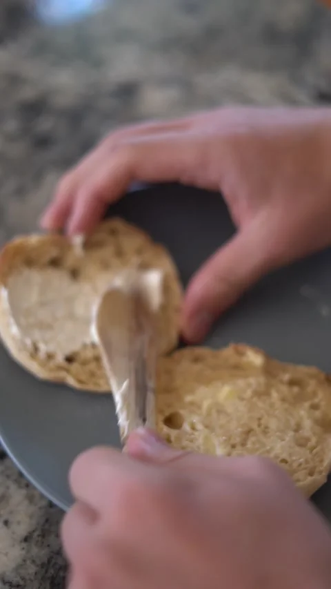 Making breakfast sandwich, cooking eggs, ham and egg sandwich, morning Stock Footage 262562790