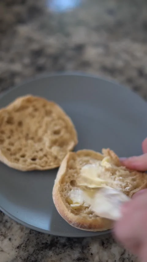 Making breakfast sandwich, cooking eggs, ham and egg sandwich, morning Stock Footage 262562814