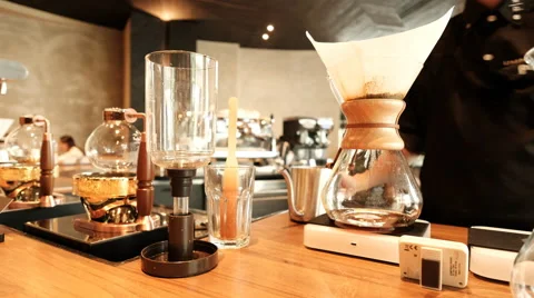 Making brewed Arabica coffee from paper filter drip style Stock Footage 66414944
