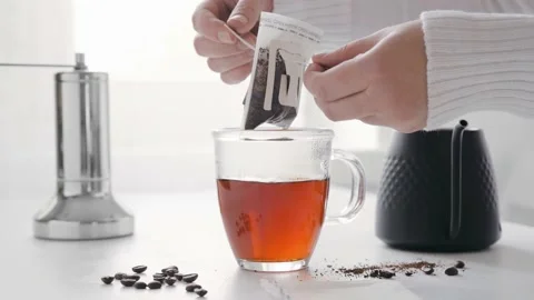 Making brewed coffee and filtering it with drip coffee bag 스톡 동영상 164314909