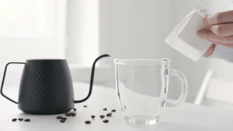 Making brewed coffee and filtering it with drip coffee bag 스톡 동영상 164315060