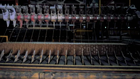 Making bricks on a conveyor belt Stock Footage 132776366