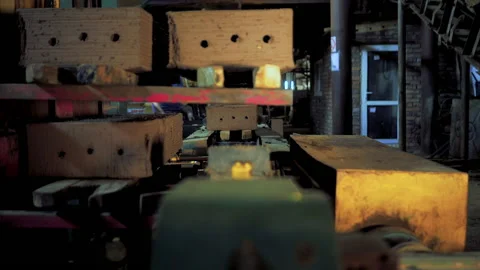 Making bricks on a conveyor belt Stock Footage 132776621