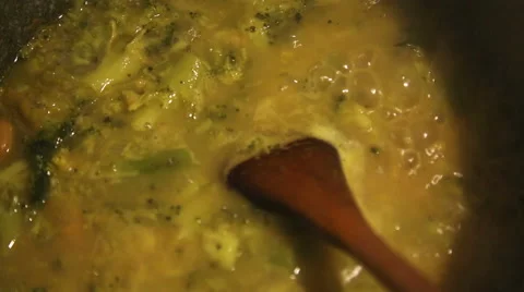 Making of broccoli soup, beans and onions, on the stove Stock-Footage 57844544