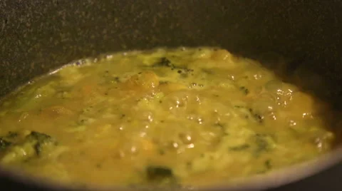 Making of broccoli soup, beans and onions, on the stove Stock-Footage 57844817