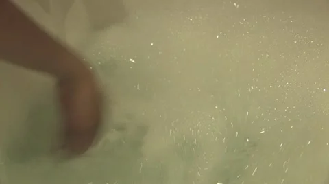 Making a bubble bath Stock Footage 11814719