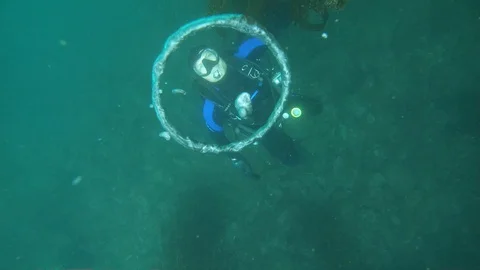 MAKING BUBBLE RINGS UNDERWATER Stock Footage 129260684