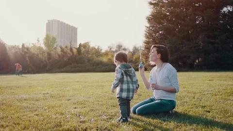 Making bubbles at sunset Stock Footage 75205291