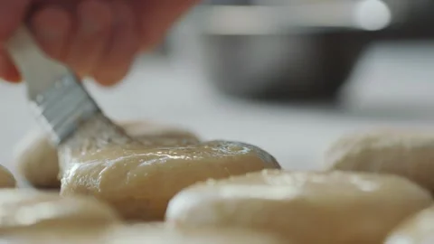 Making Burger Buns by Brushing Egg Wash on Raw Dough for Baking in Kitchen 库存影片 331100938