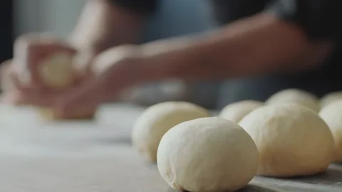 Making Burger Buns by Hand in a Professional Kitchen Vídeos de archivo 331100914