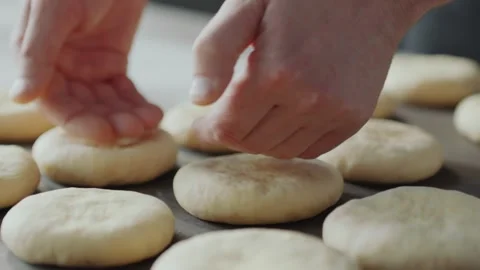 Making Burger Buns by Hand in a Professional Kitchen Bakery Vídeos de archivo 331100926
