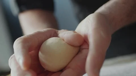 Making Burger Patty by Shaping Fresh Dough with Hands in the Kitchen Stock Footage 331100906
