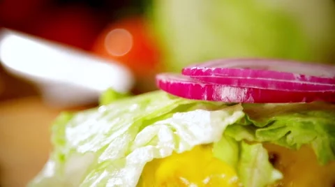 Making up of the burger in slow motion Stock Footage 67860393