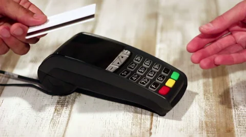 Making cahless payment and printing buyers chek using pos  terminal Stock Footage 65394779