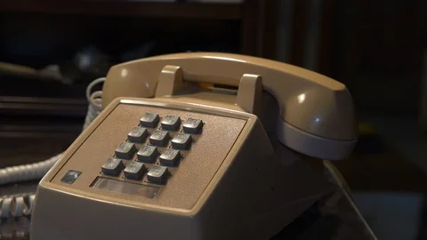 Making a call on a vintage touch tone phone Stock Footage 93531526
