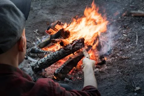 Making campfire at a forest.  Stock Photos