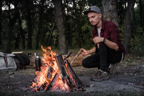 Making campfire at a forest.  Stock Photos